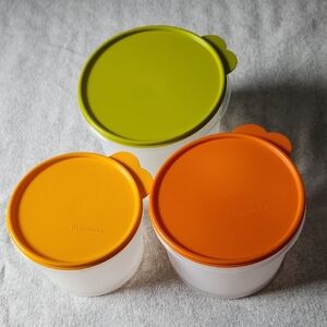 Set of Three Tupperware Plastic Containers with Green and Orange Lids.